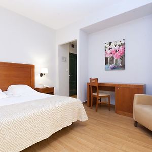 Kamer met een Queen Size Bed